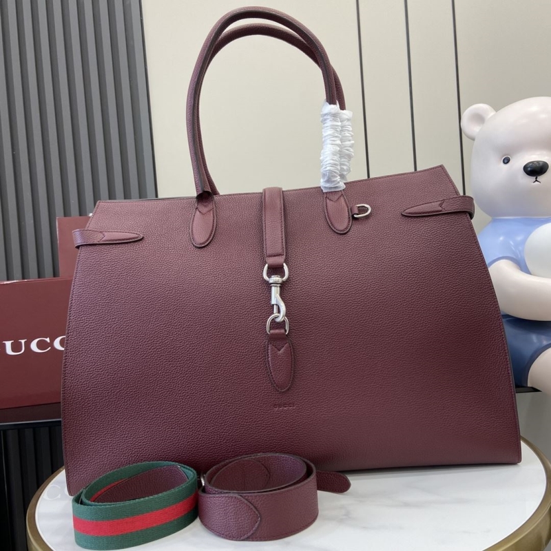 G*u*i top handle bags